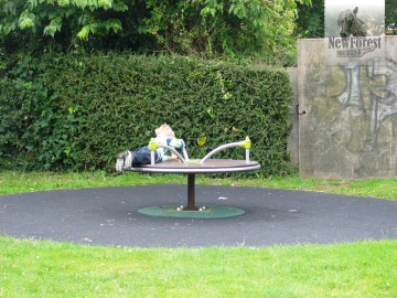 lymington-playground-roundabout Roundabout and Graffiti