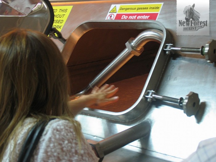 Feeling the heat of the chemical reaction in one of the Fermentation Vessels.